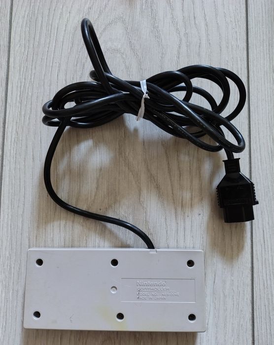 Konsola Nintendo NES + pad + zasilacz + AV + 3 gry Tetris, Super Mario