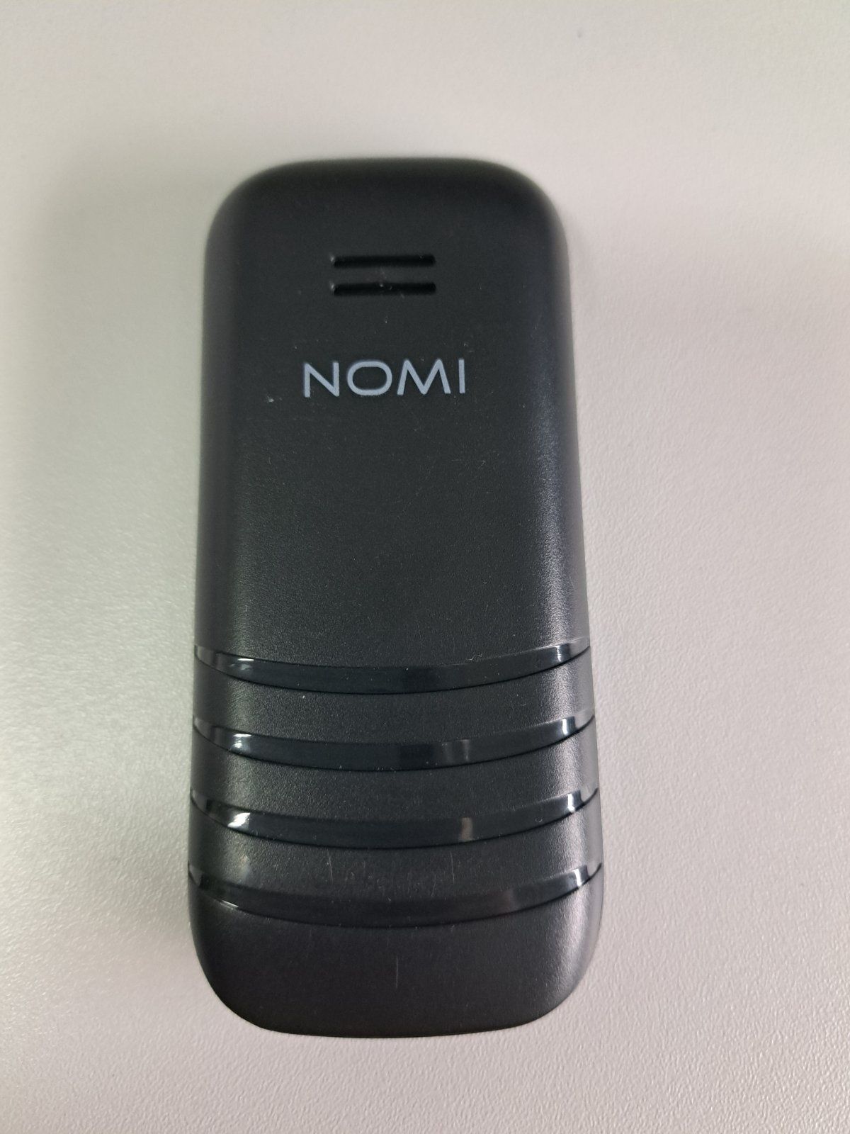 Мобильный телефон nomi