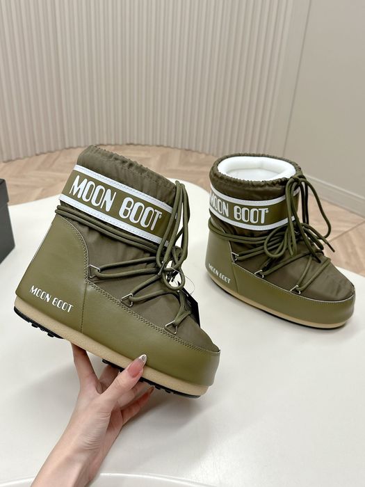 Чоботи, снігоходи, мунбути Moon Boot