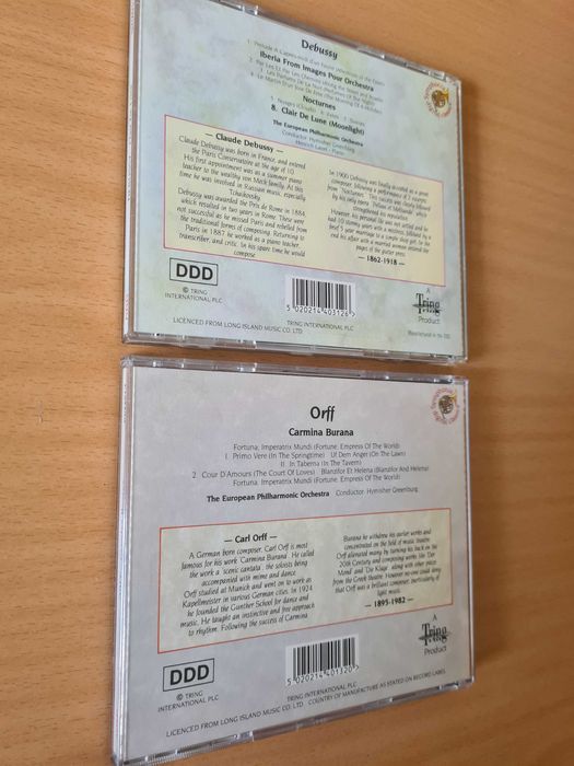 2 CDs audio com música de Debussy e Orff