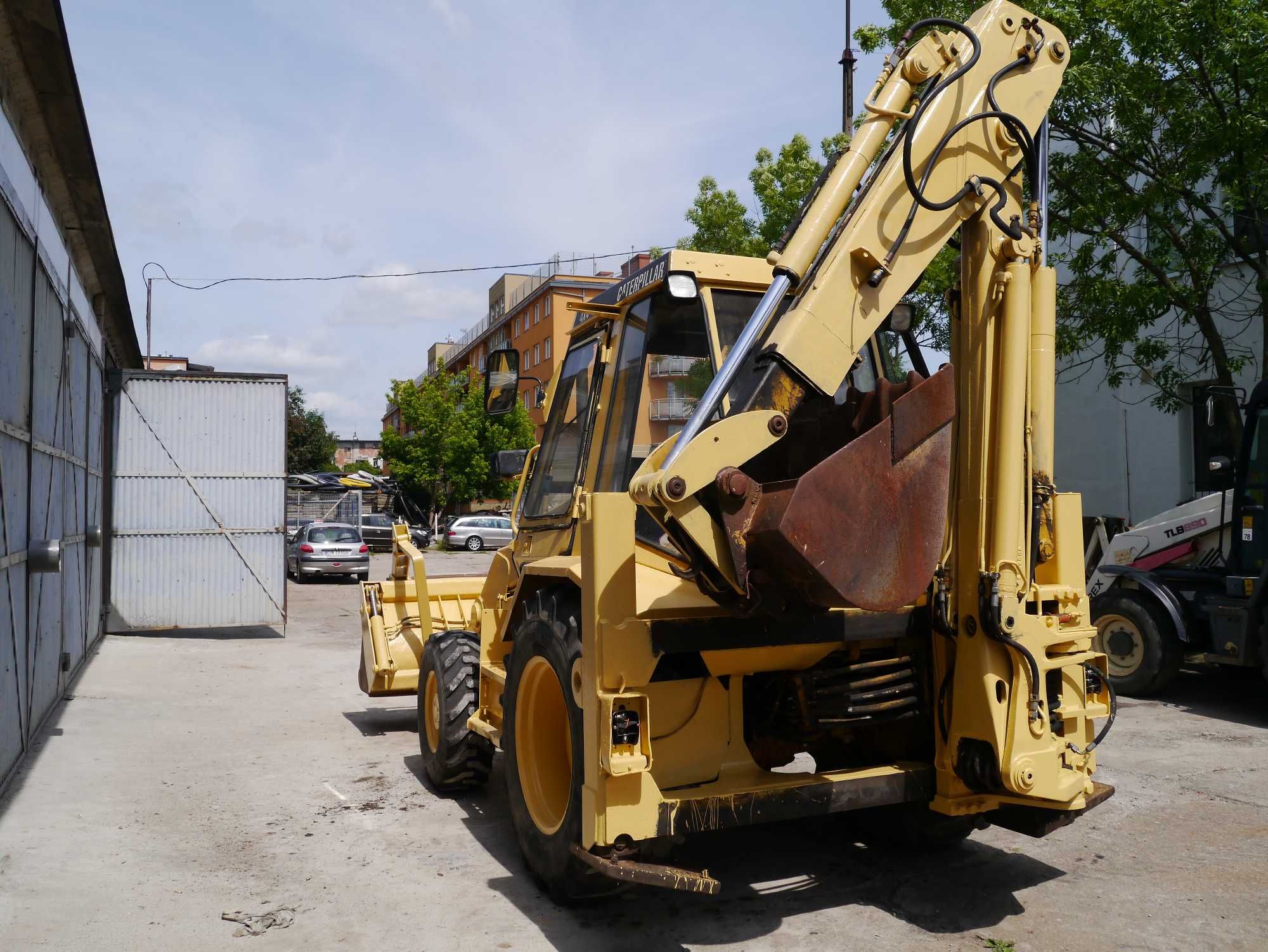 Koparko-ładowarka Caterpillar 428, 1990r