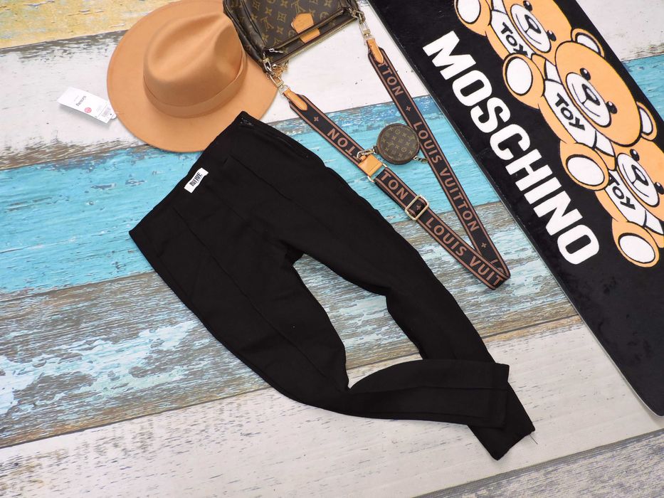 Native Czarne spodnie bryczesy kant S