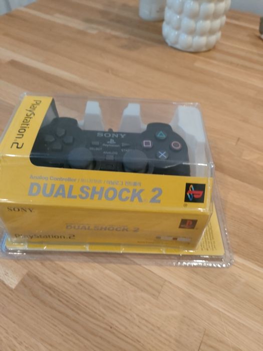 Pad po konsoli ps2