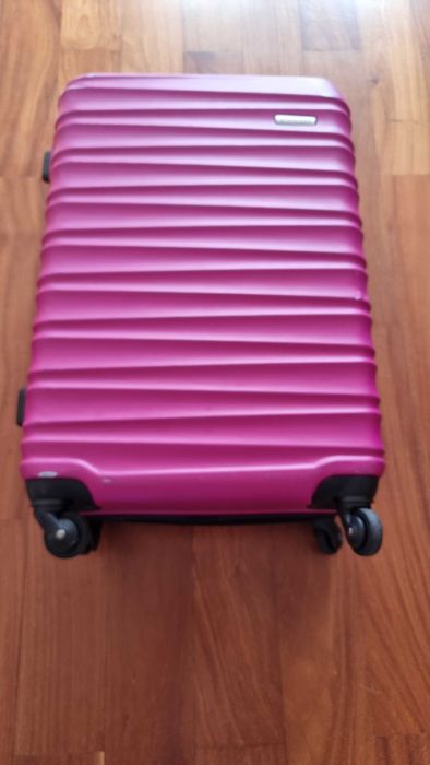 Różowa walizka podróżna Witchen o wymiarach 65x45x27 cm