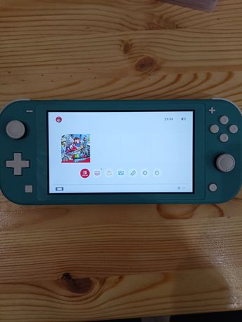 Konsola Nintendo Switch lite z grą super mario odyssey