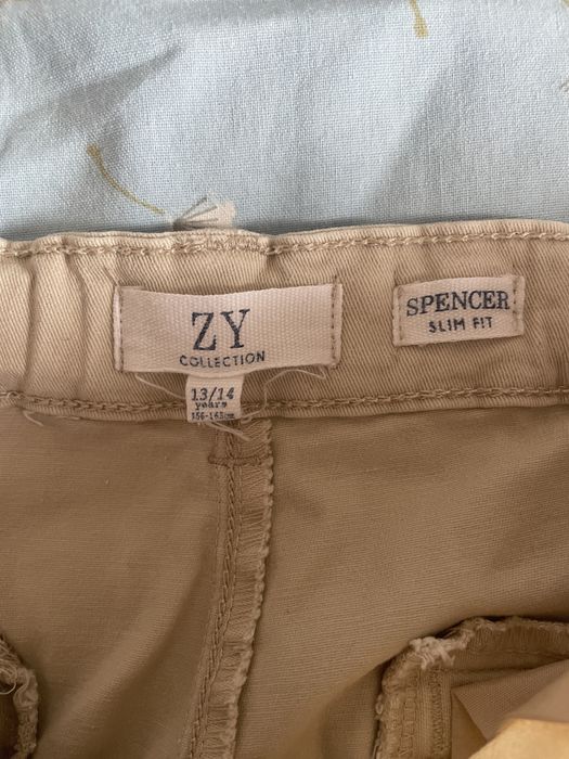 Calças bege slim fit Zippy