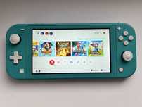 MEGA ZESTAW! Nintendo Switch Lite stan idealny + 14 gier + case + SD