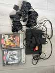 PlayStation 2 Slim + 3 pady + karta pamięci + 2 gry