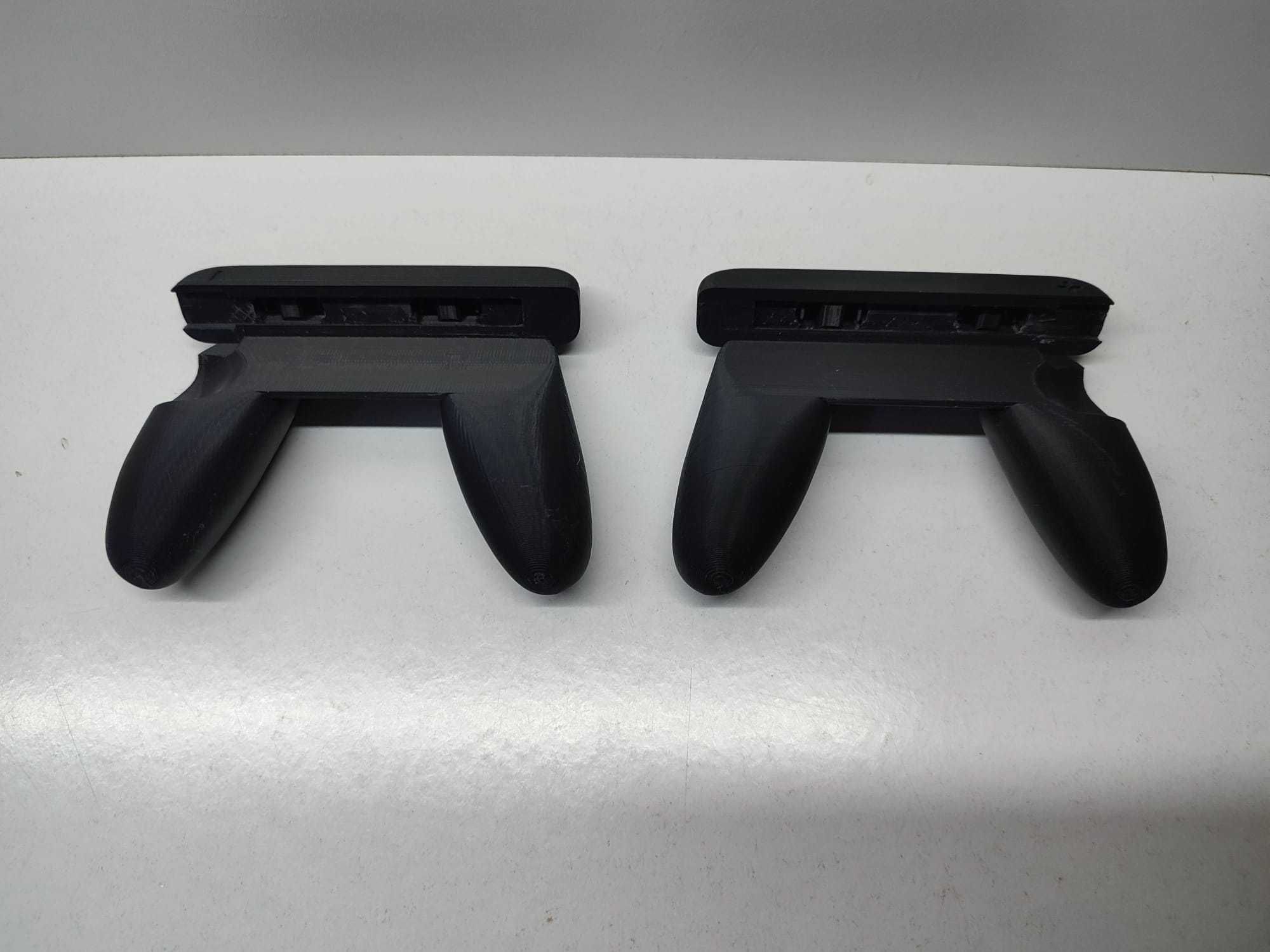 2 Suportes para Comandos Nintendo Switch Joy-Con