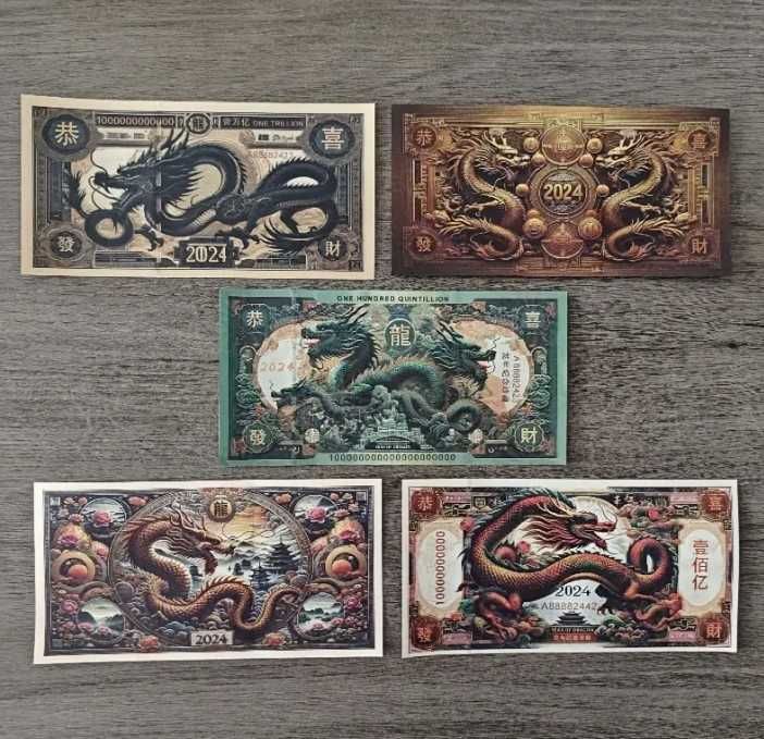 Kolekcjonerski zestaw banknotów?? przedstawiających chińskie smoki