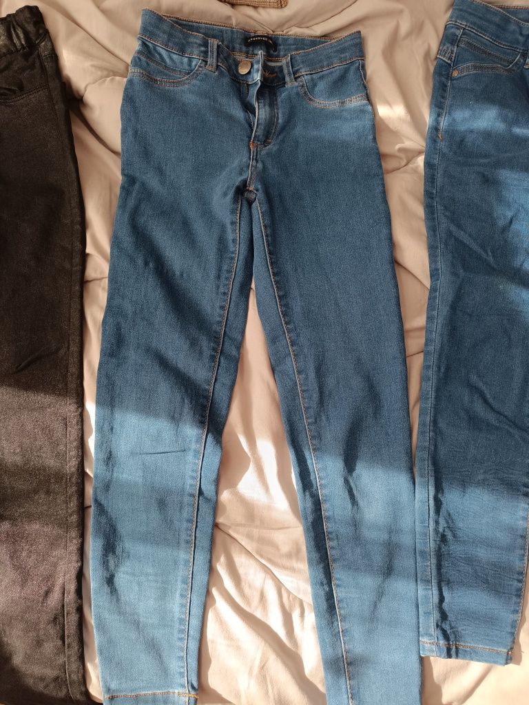 Reserved modne spodnie 146