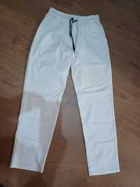 Białe ,elastyczne spodnie w gumkę 2 XL