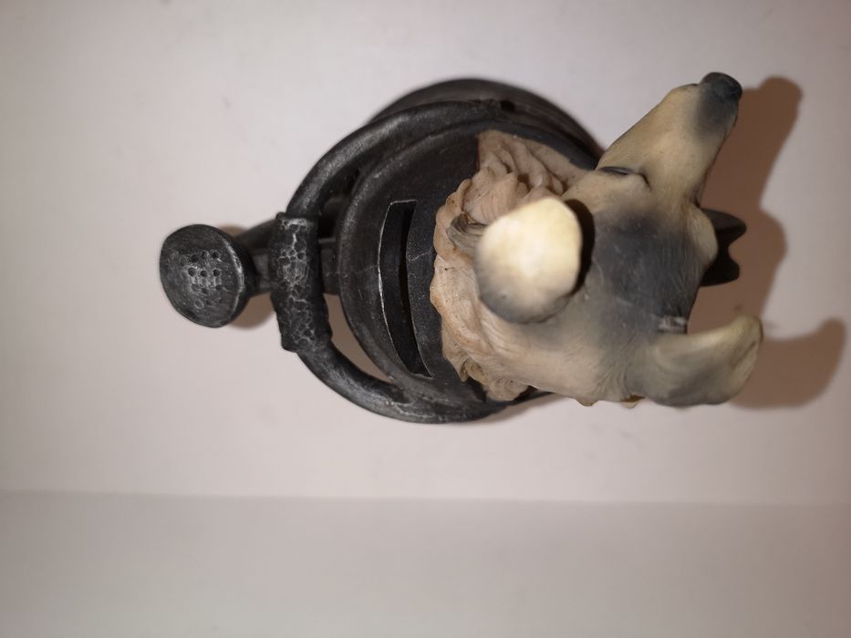 Skarbonka w kształcie pieska w konewce