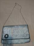 Mala prateada de mão (clutch) ou tiracolo