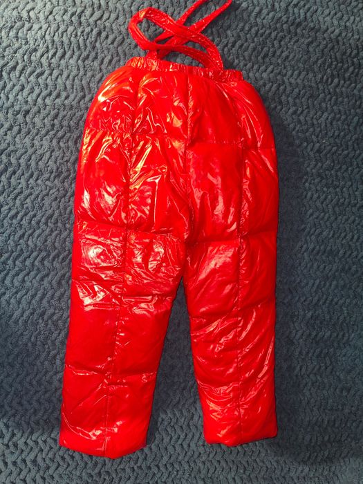 Красный зимний комбинезон Moncler