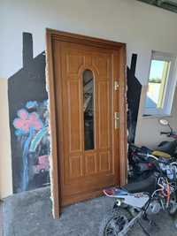 Drzwi wejściowe zewnętrzne 100 drewniane porta przeszklone złoty dąb
