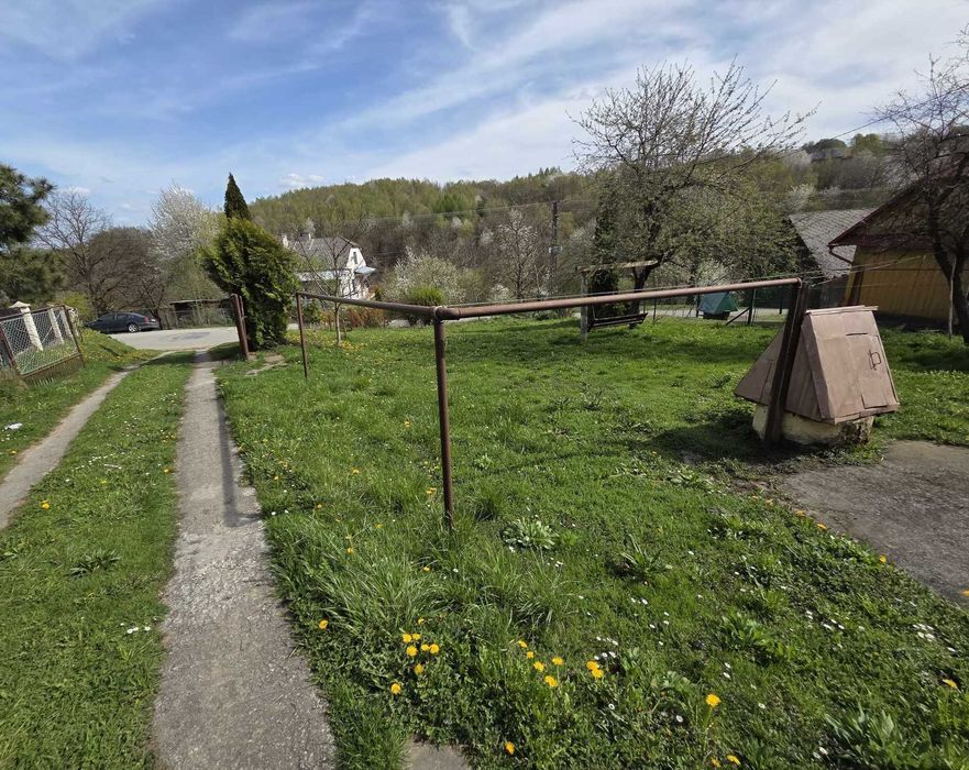 Sprzedam dom drewniano-murowany 60m2, działka 23,59a.