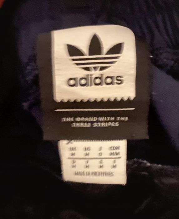 Calças Adidas conversível para calções
