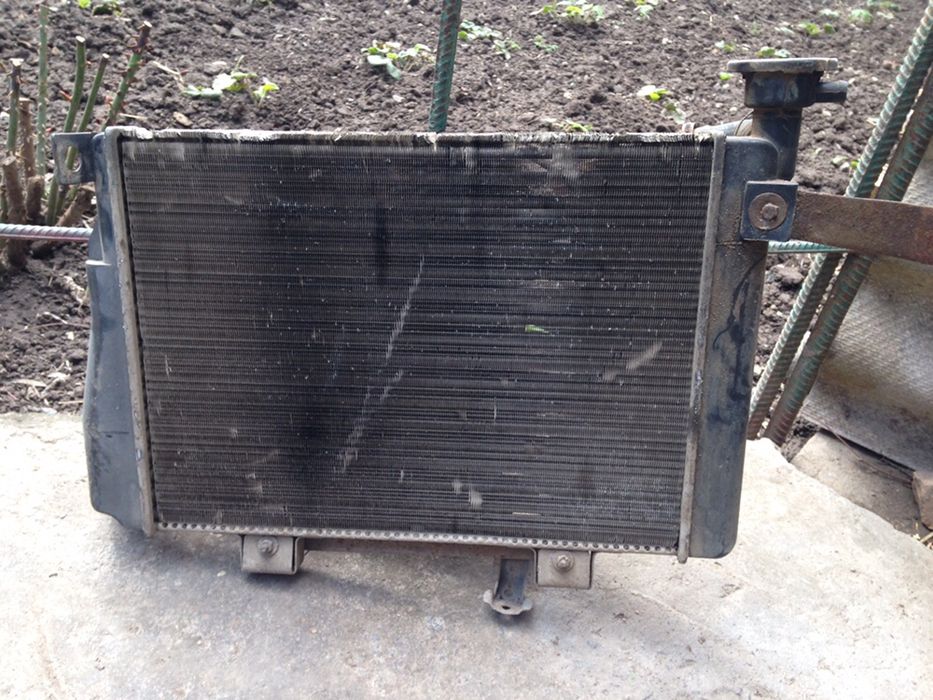 Продам радіатор + вентелятор охолодження Nissan cherry