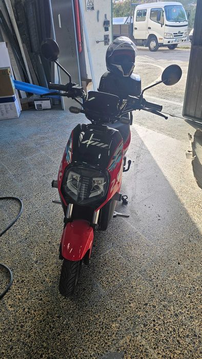 Mota como nova ainda na garantia