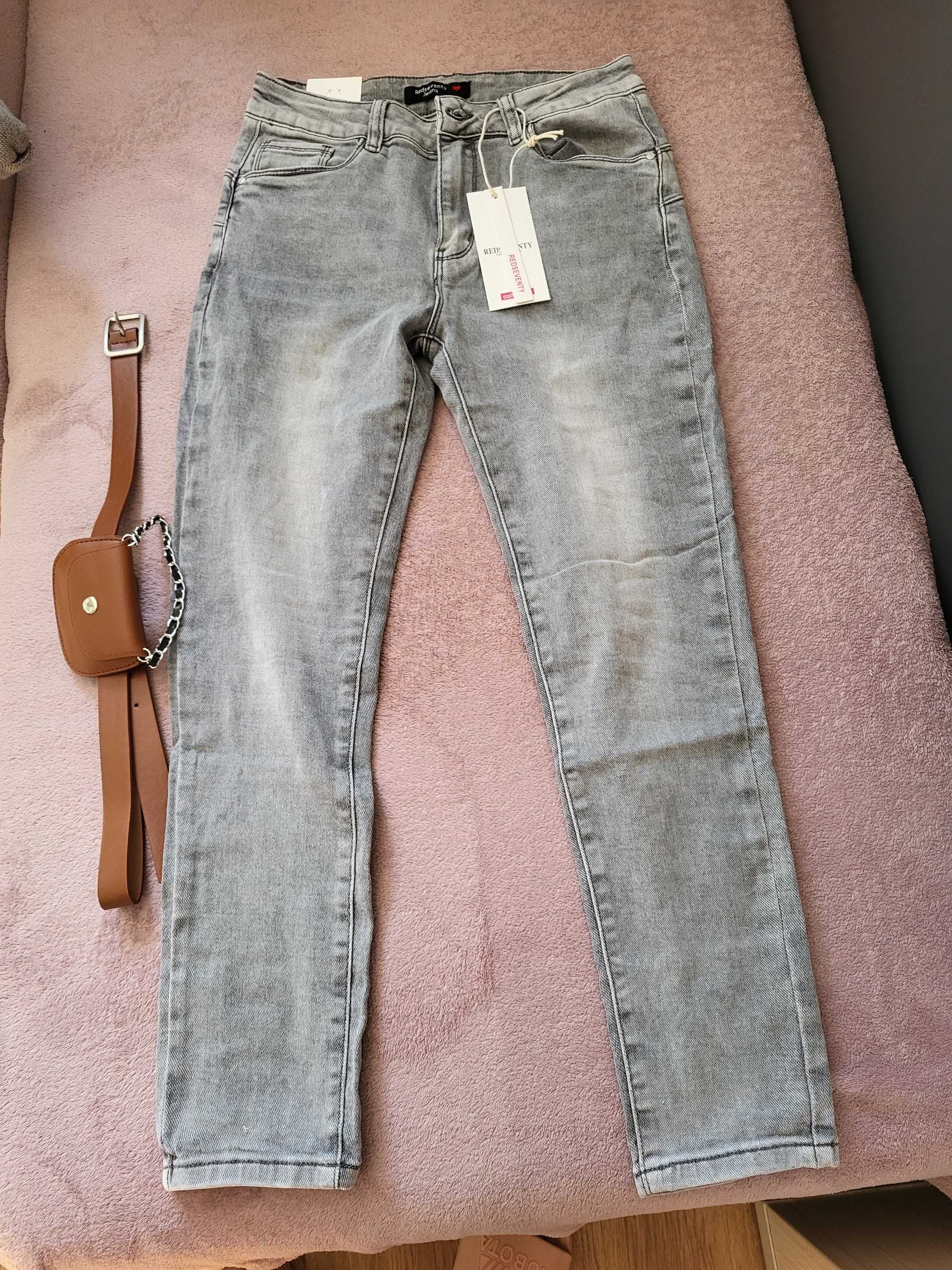 Jeansy push up rozniar L z paskiem
