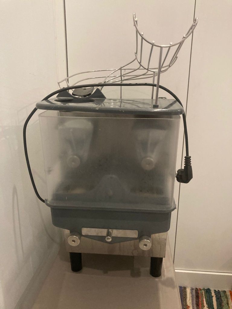Máquina de fazer sumo de laranja..