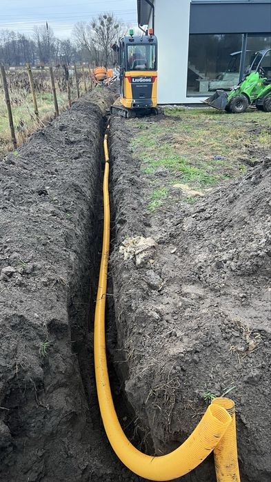 Prace ziemne/Drenaż/Odwodnienia/Zbiornik na deszczówkę/Niwelacja teren