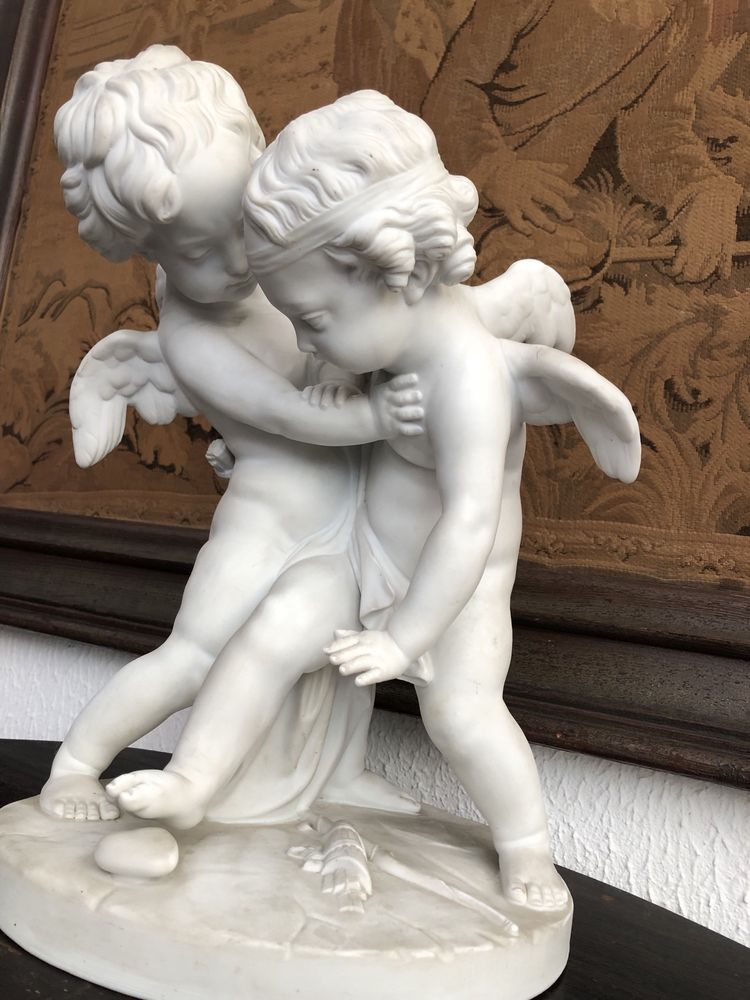 Cupidos em biscuit