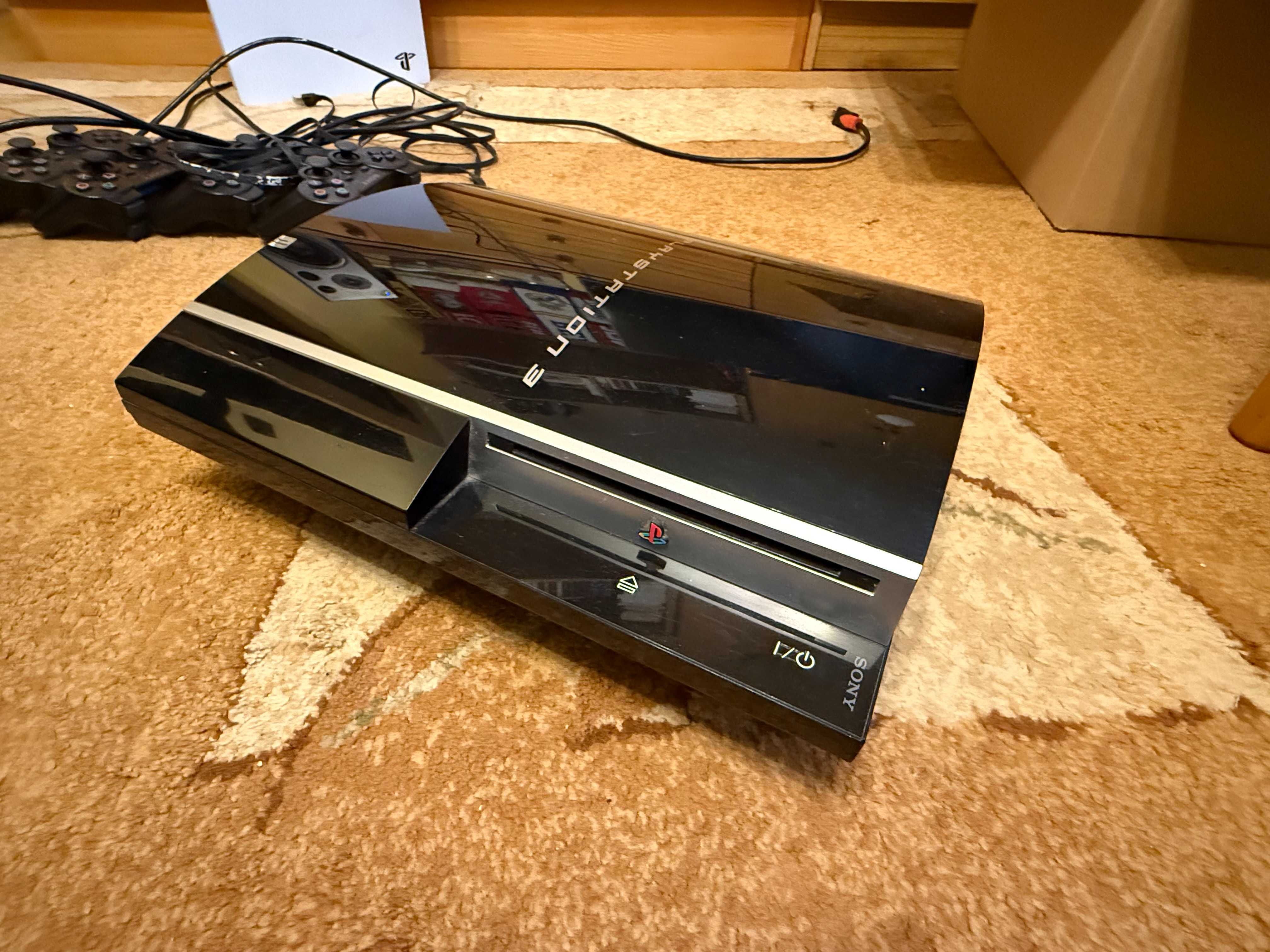 Konsola Playstation 3  PS3 + cztery pady