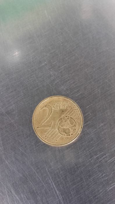 moeda de 2 centimos com defeito na cor