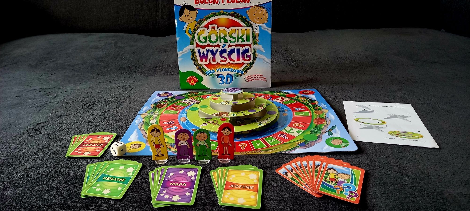 Bolek i Lolek Górski Wyścig 3D, gra planszowa, Aleksander