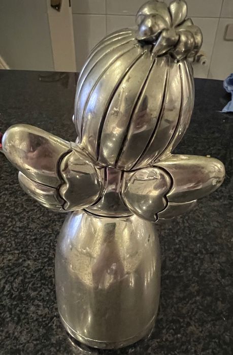 Vendo estátua banhada a prata