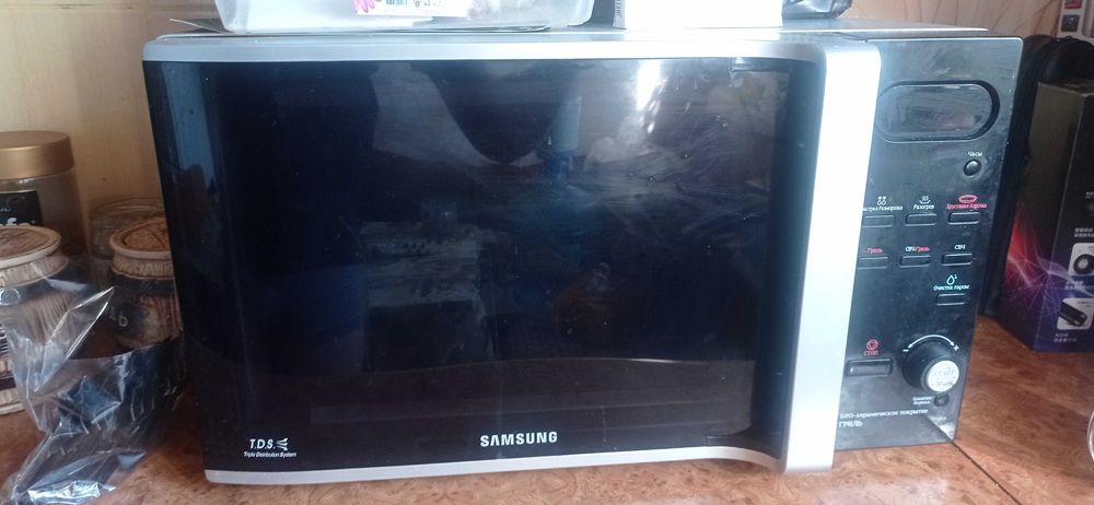 Продам микроволновую СВЧ с грилем SAMSUNG GE107LRS