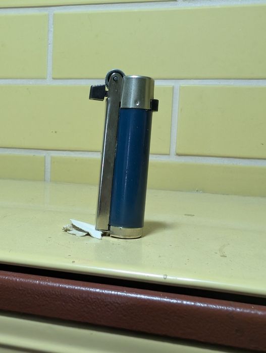 Zapalniczka premet predom