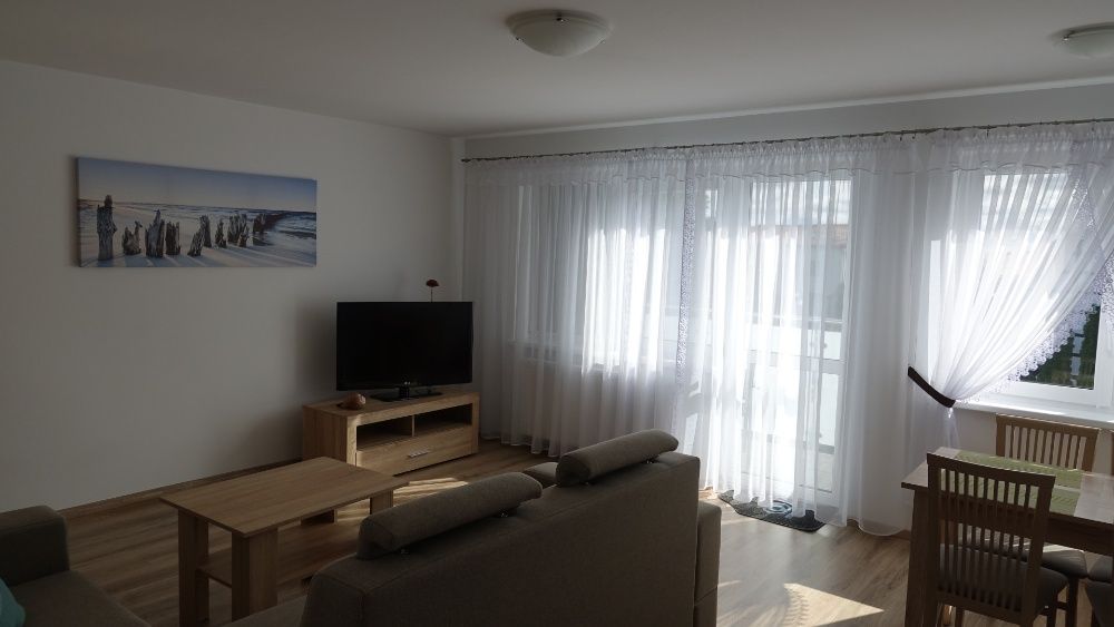 Rowy Apartamenty i pokoje gościnne Pod Dębem