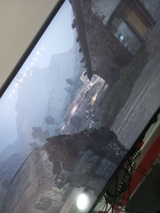 PS 4 com jogos e comandos