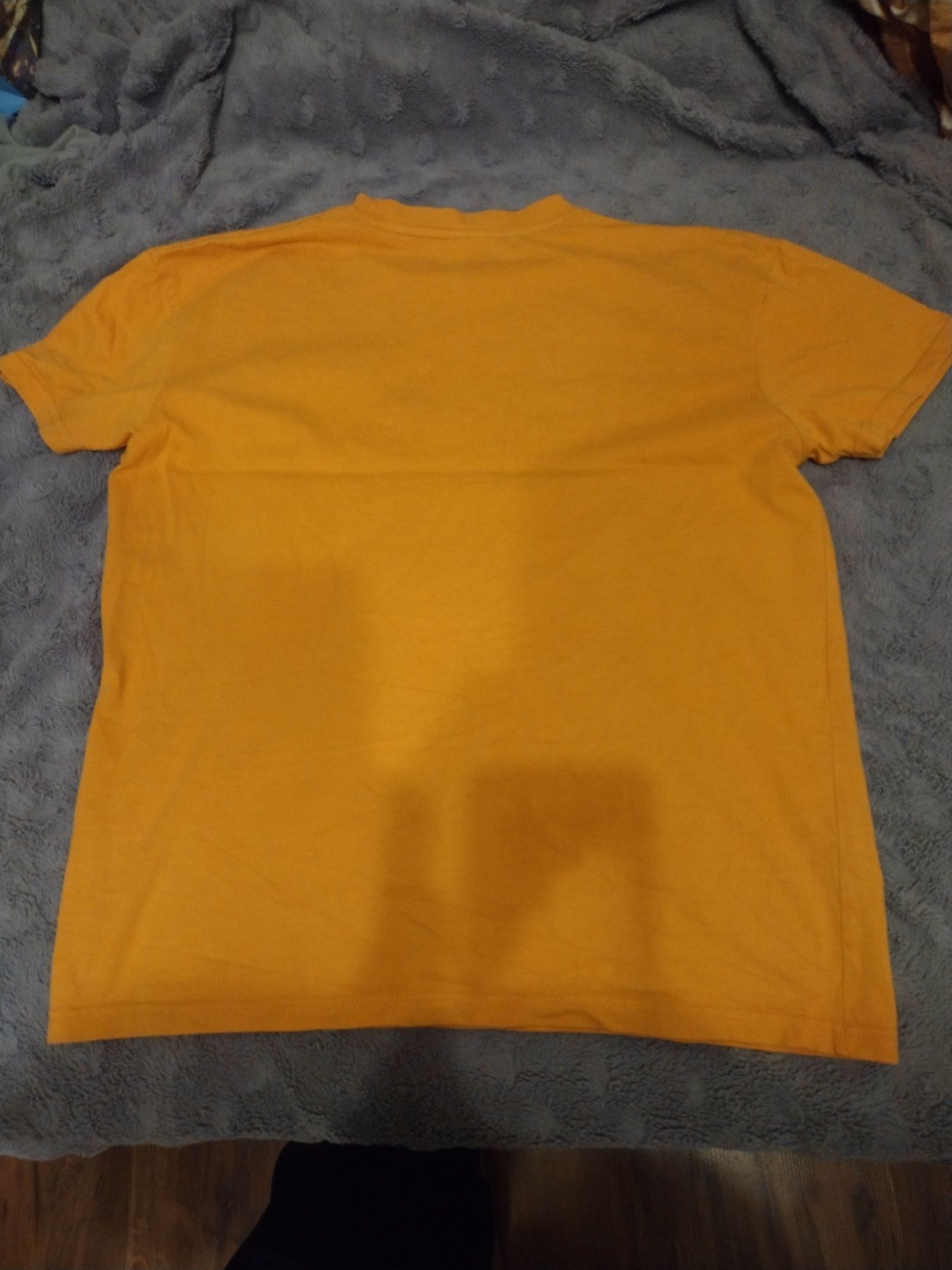 Dwa t-shirt rozmiar 158 żółta trochę wieksza
