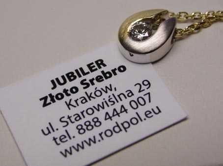 Złota dwukolorowa zawieszka z diamentem brylant 0,18 ct. + łańcuszek.