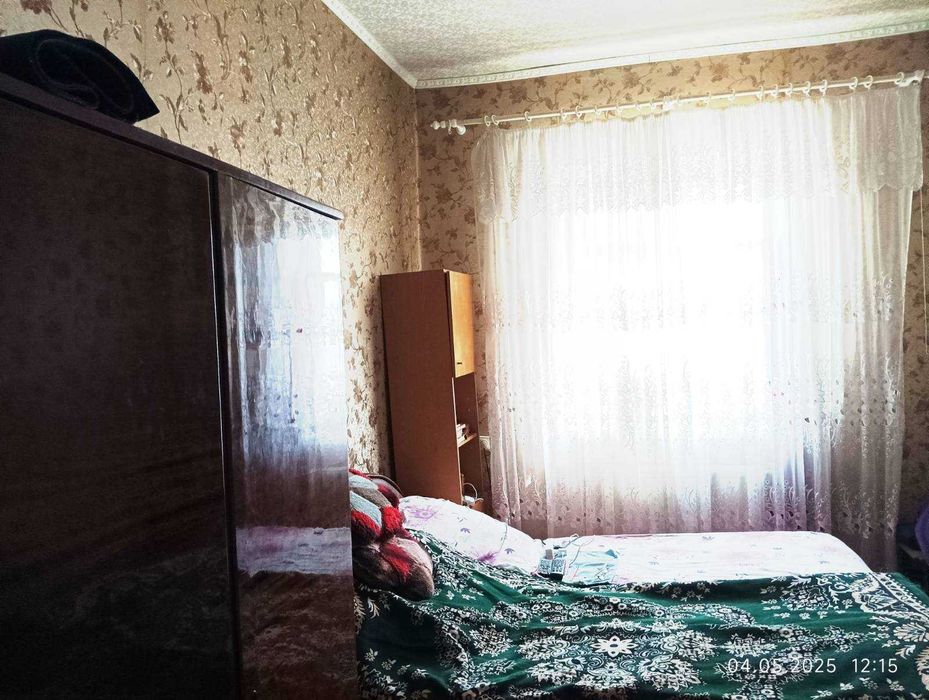 Продам.. 1/2 дома в Мерефе район вокзала.