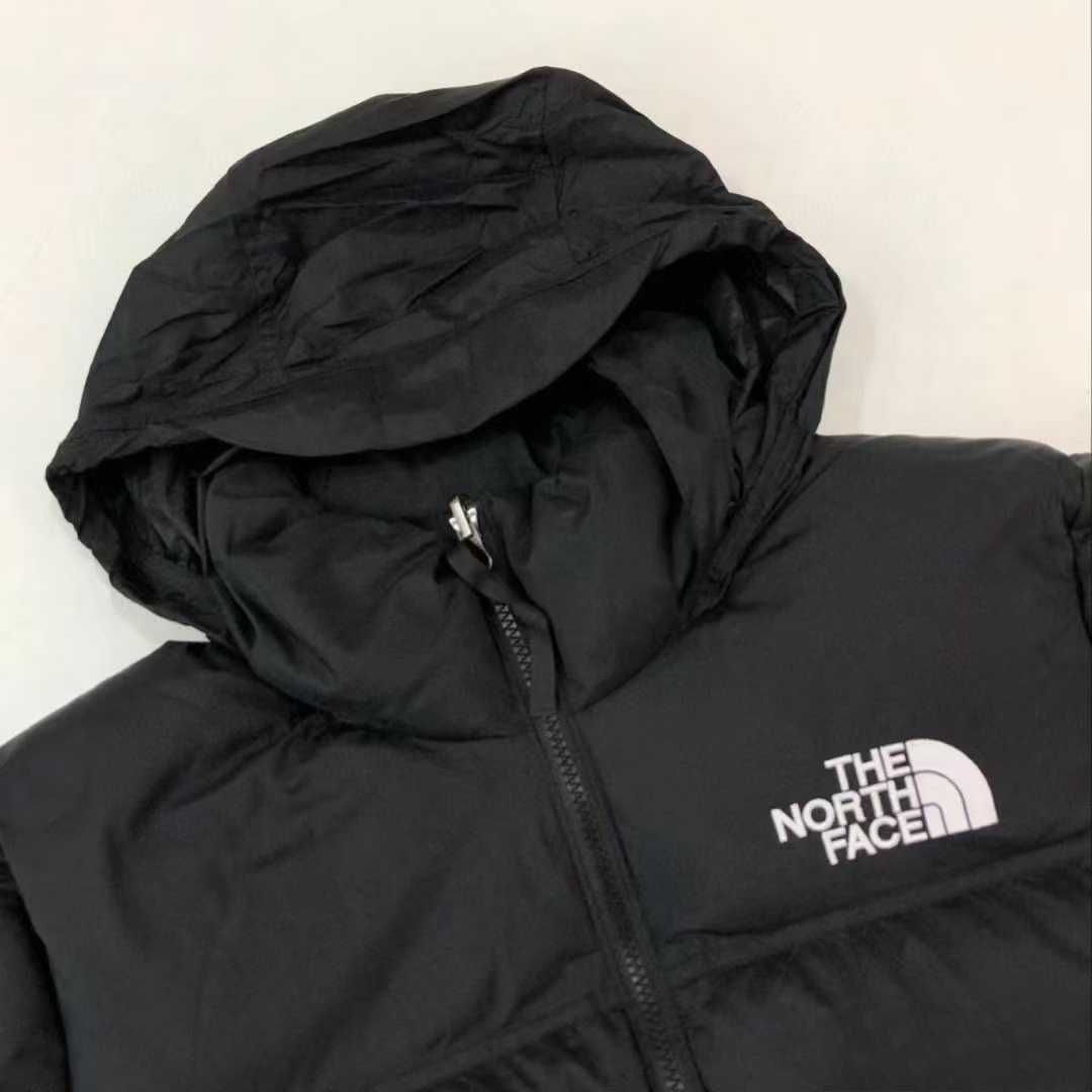 Stylowe puchowe kurtki The North Face dla par. rozmiar: L