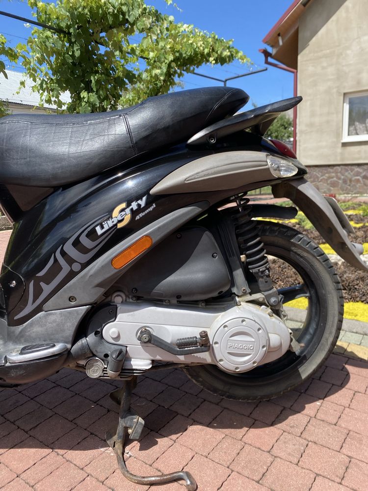 Скутер piaggio 4т