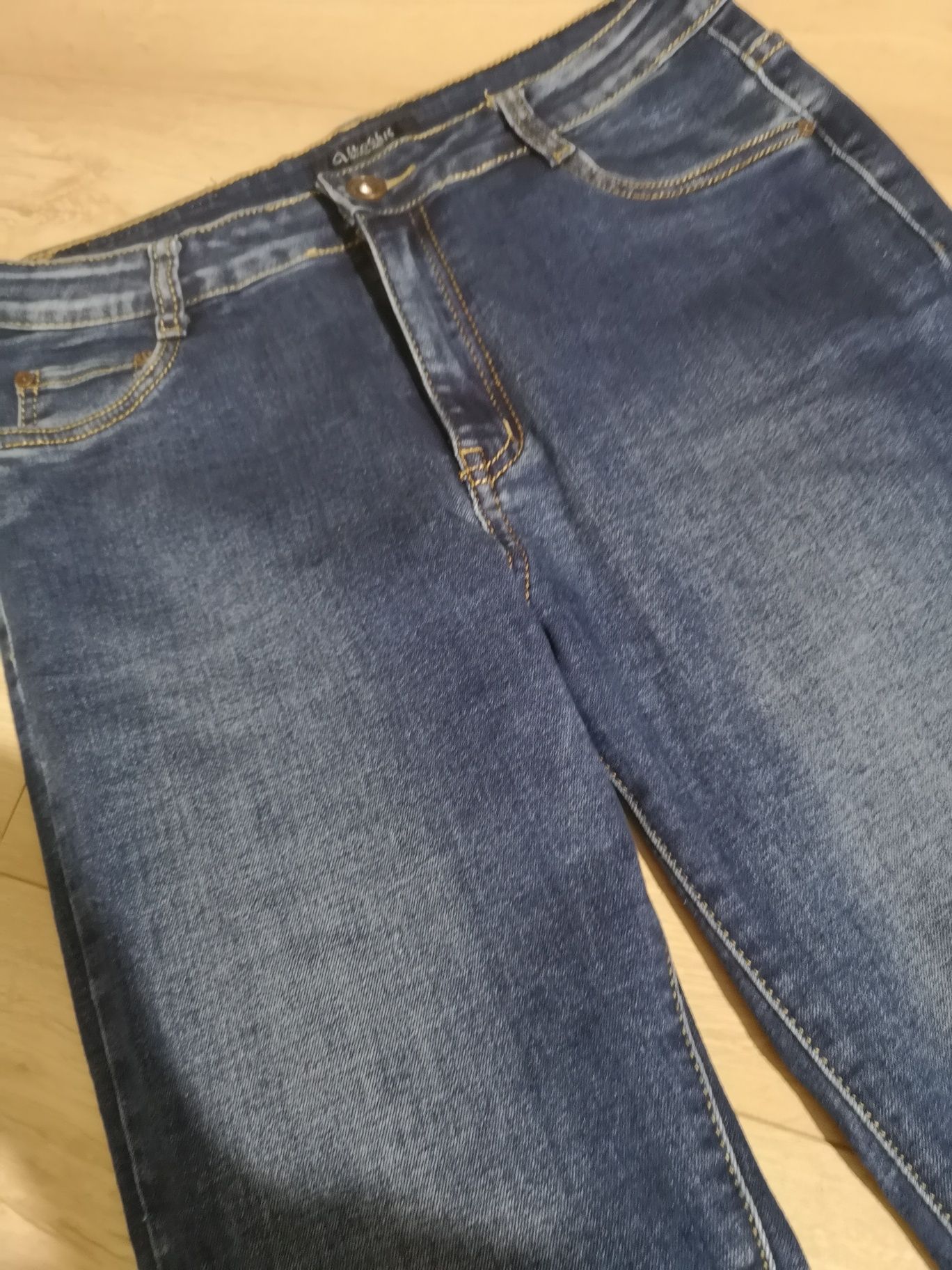 Spodnie jeans dżinsy damskie 40 L długie ciemne cieniowane