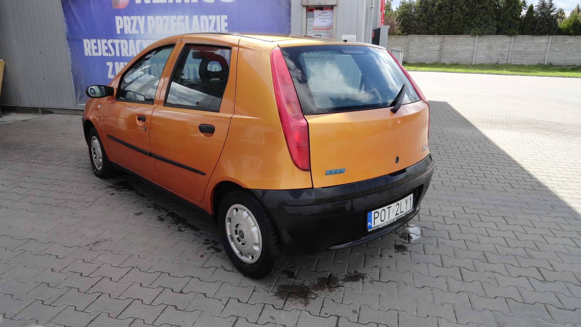 Błotnik prawy Fiat Punto pomarańczowy kolor 571