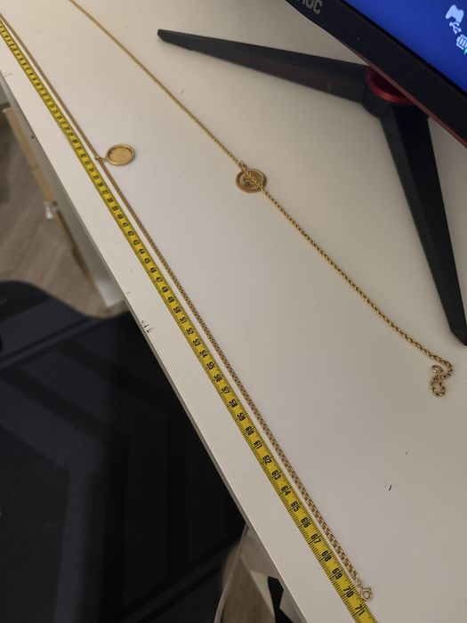 Fios de ouro 19,2k com medalhas de libra