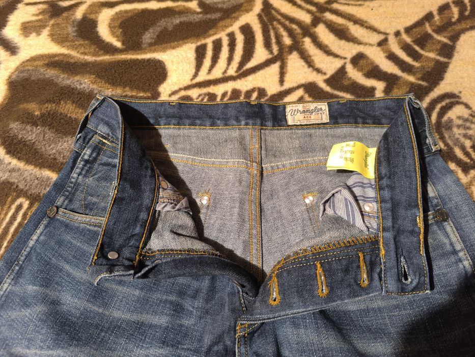 Spodnie jeansowe męskie granatowe Wrangler ACE  W32 L34