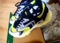 Buty sneakers Lacoste czarno -zółte z dodatkami srebrzystymi