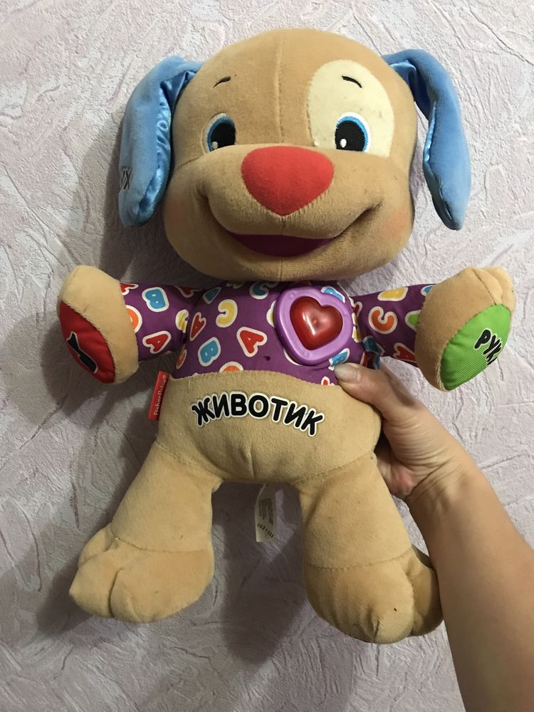 Іграшка собачка-музикальна