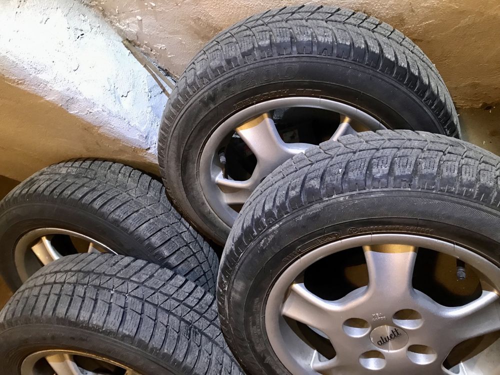 Koła komplet. Prawie nowe opony + alufelgi 185/60 R14 82T