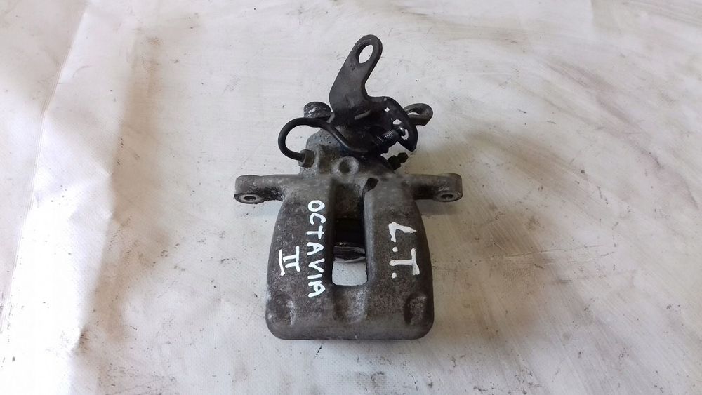 ZACISK LEWY TYŁ TYLNY OCTAVIA II 2 1.6 8V 04-