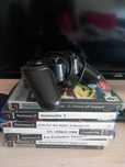 Playstation 2 (inclui 19 jogos e 1 comando)